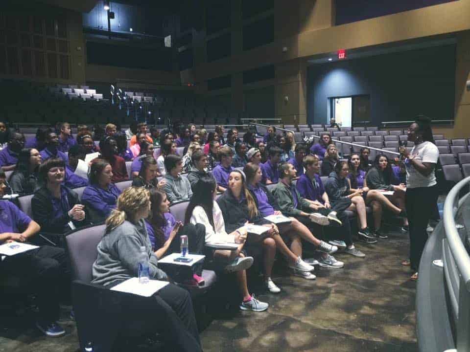 Students sitting in auditorium