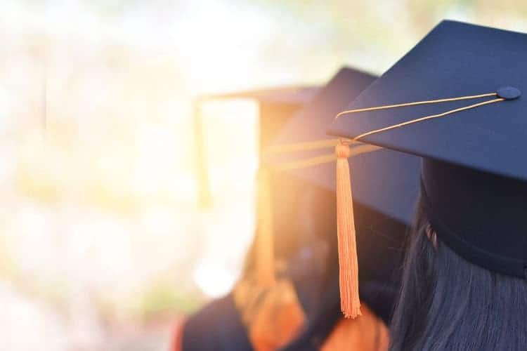 Graduate caps with lens flare in the sun